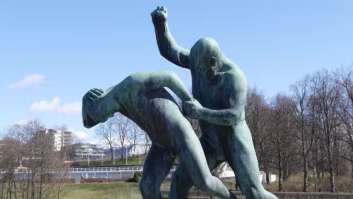 Oslo Image 16 of 64 Nr. 12: Gammel mann slår gutt, før juni 1930. Bronse.