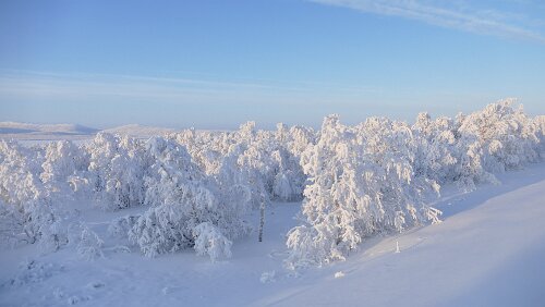 Puoltikasvaara – Tromsø Die Sonne flutet die Landschaft mit Licht
